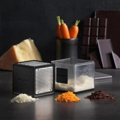 Microplane Cube Grater -Peuget Knives Shop MP34002 Microplane Cube Grater Black with Grated Foods