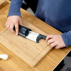 Twinny Kid's Chef's Knife By Zwilling -Peuget Knives Shop ZHTwinny Putting on Sheath