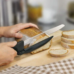 Swiss Classic 8" Serrated DUX-Knife With Adjustable Slicing Guide By Victorinox -Peuget Knives Shop vf6866321 slicingbread x1000 4cd18568 8e47 4881 b791 dd180096a8e6